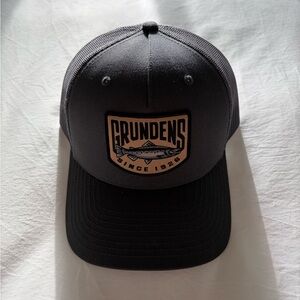 Grundens Black Trucker Cap with Patch